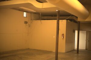 Southwestward view of warehouse / office walls.