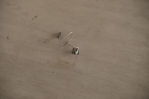 Conduit in the middle-back of the showroom floor.